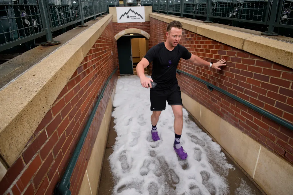 Featured image for "Hailstorm Hits Coors Field, Delays Rockies-Dodgers Game"
