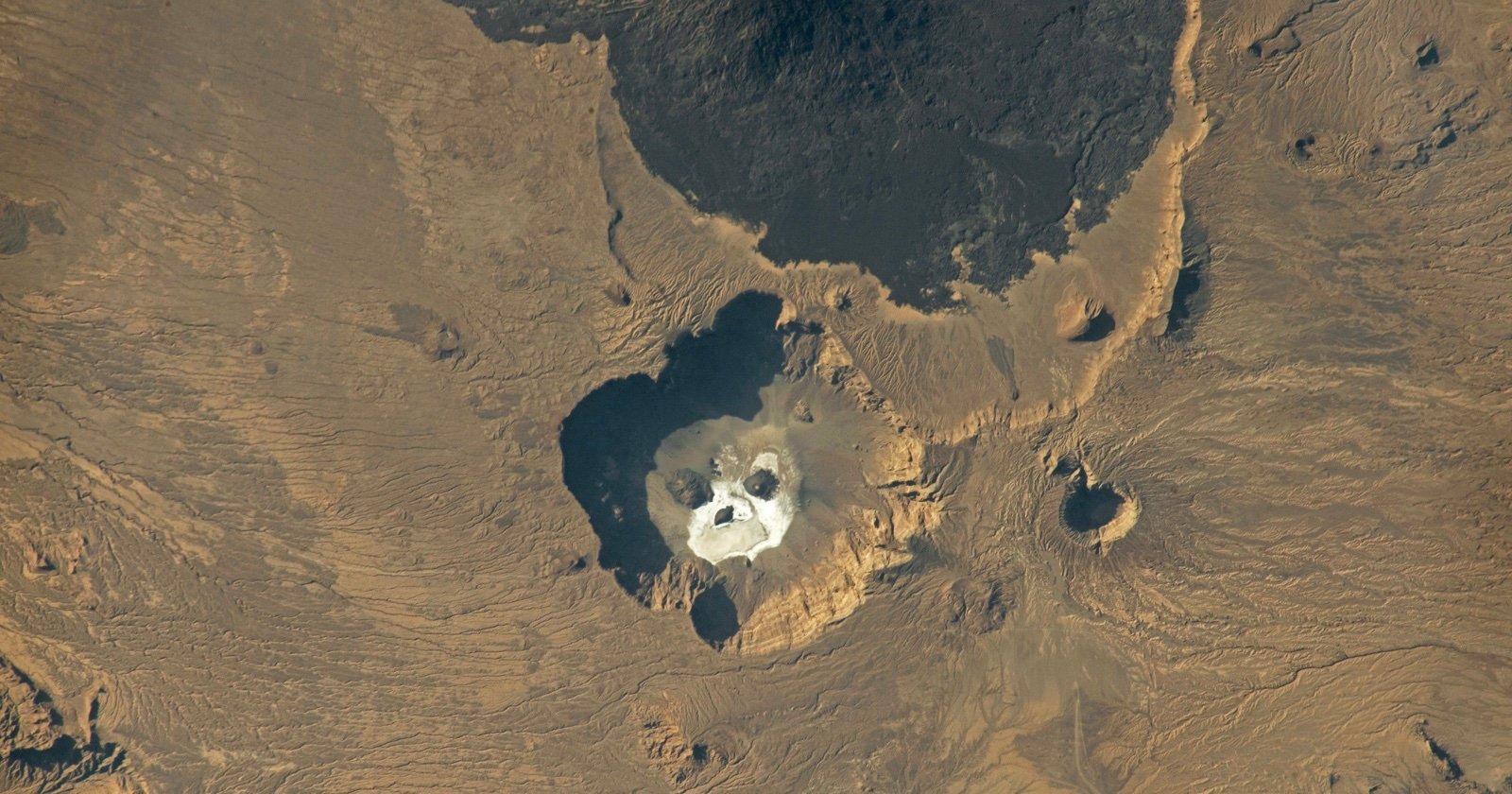 Featured image for Astronaut's Haunting Encounter: Giant Skull Gazes Back From Earth