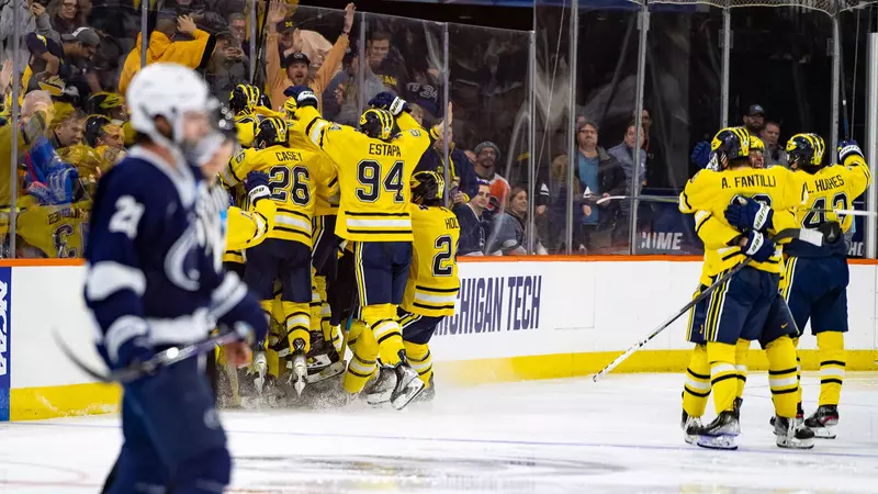 Featured image for Michigan Hockey Secures 27th Frozen Four Bid with OT Win Over Penn State.