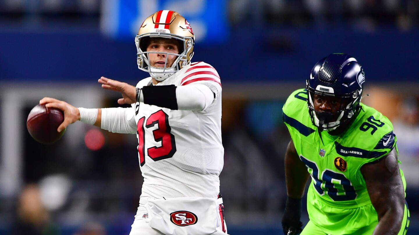 Featured image for "49ers QB Purdy's Unbelievable Throw Takes Offense to New Heights"