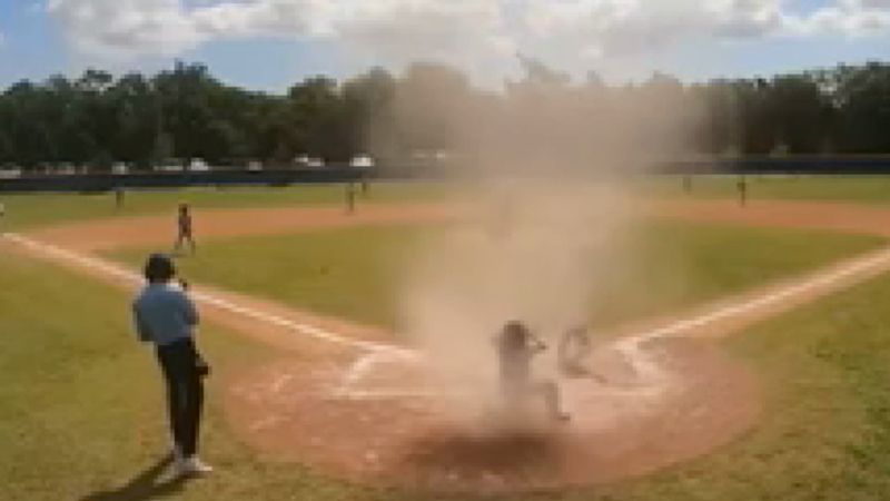 Featured image for Dust devil causes chaos at youth baseball game, umpire saves the day.