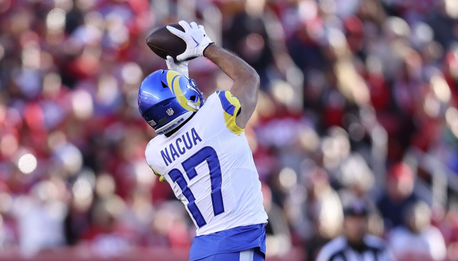 Featured image for "Puka Nacua Shatters NFL Rookie Receiving Records with Rams"