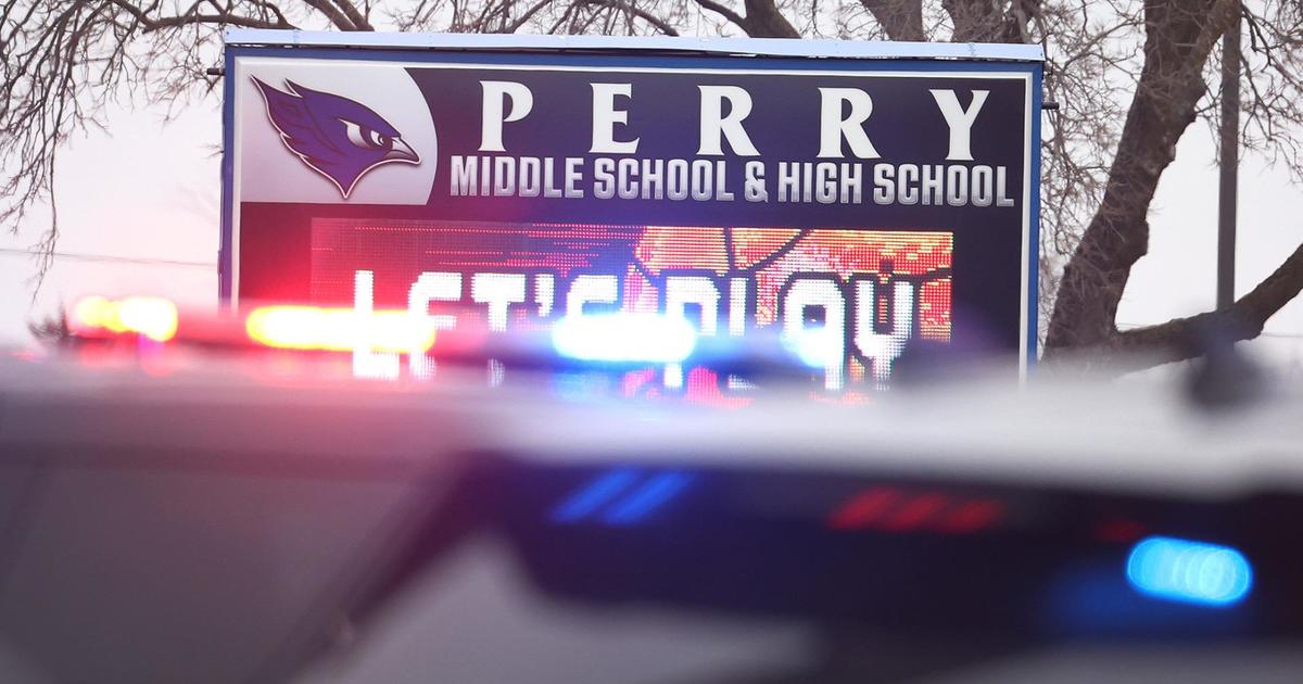 Featured image for "Perry, Iowa Tragedy: Community Mourns Young Victim, Calls for Action After School Shooting"