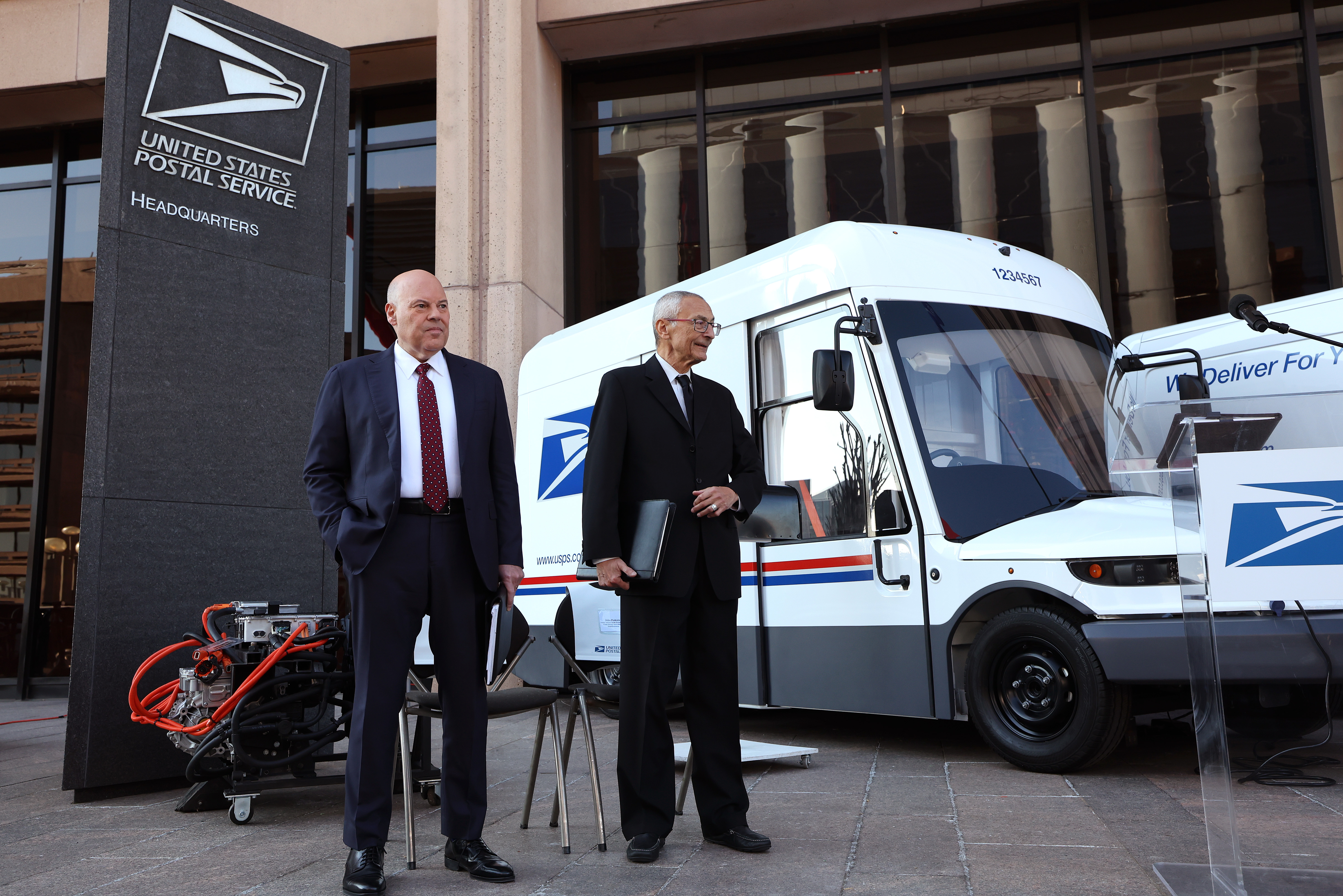 Featured image for "Louis DeJoy's Surprising Transformation: From Trump's Villain to Biden's Clean Energy Ally"