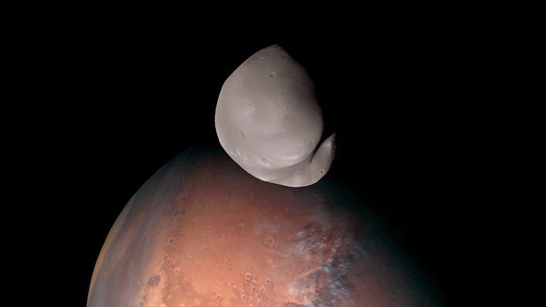 Featured image for "Hope Mission captures revealing close-ups of Mars' tiny moon Deimos"