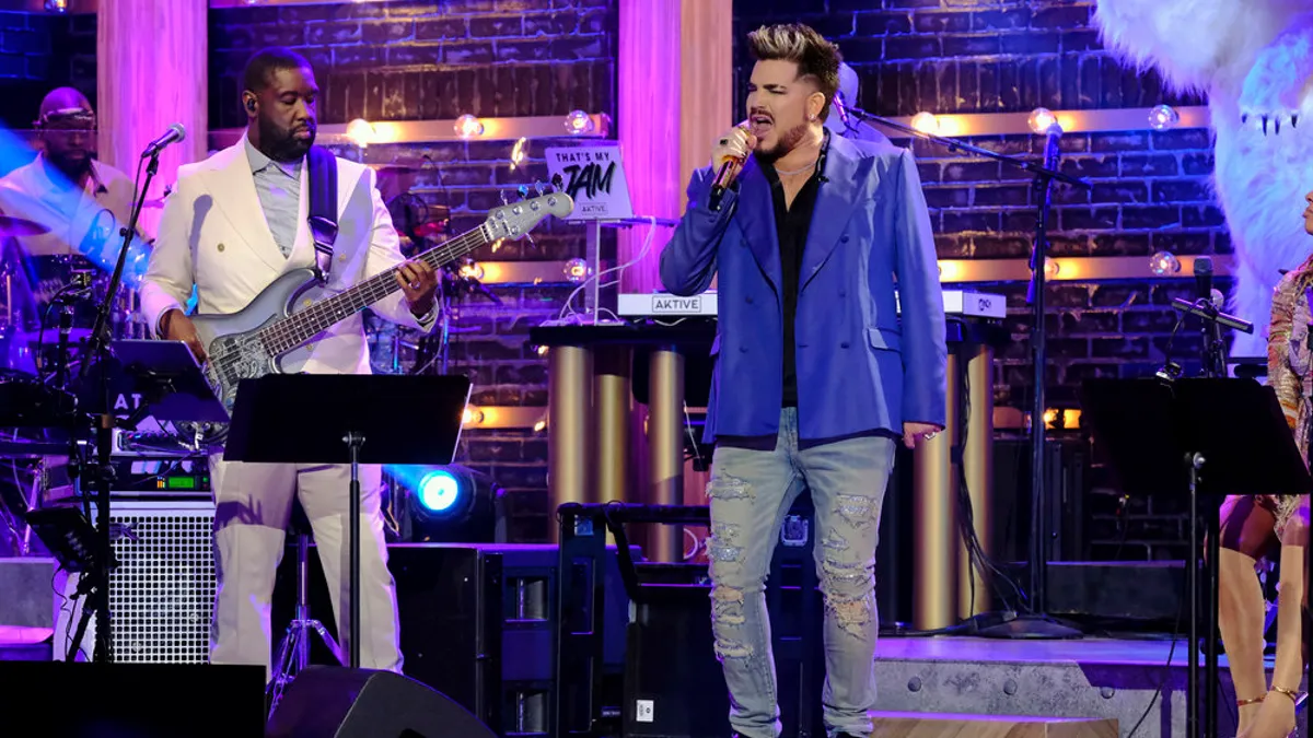 Featured image for Adam Lambert's Incredible Cher Impression in 'The Muffin Man' Performance.