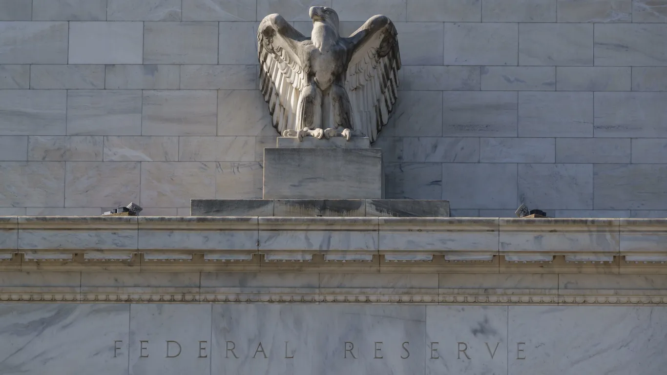 Fed Maintains Rates Amid Inflation Concerns and Economic Projections