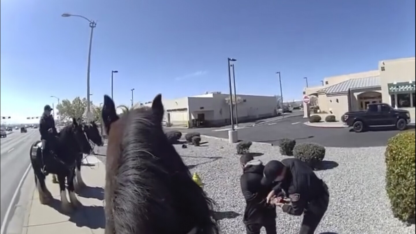 Featured image for "Police on Horseback Chase Shoplifter in New Mexico, Caught on Video"