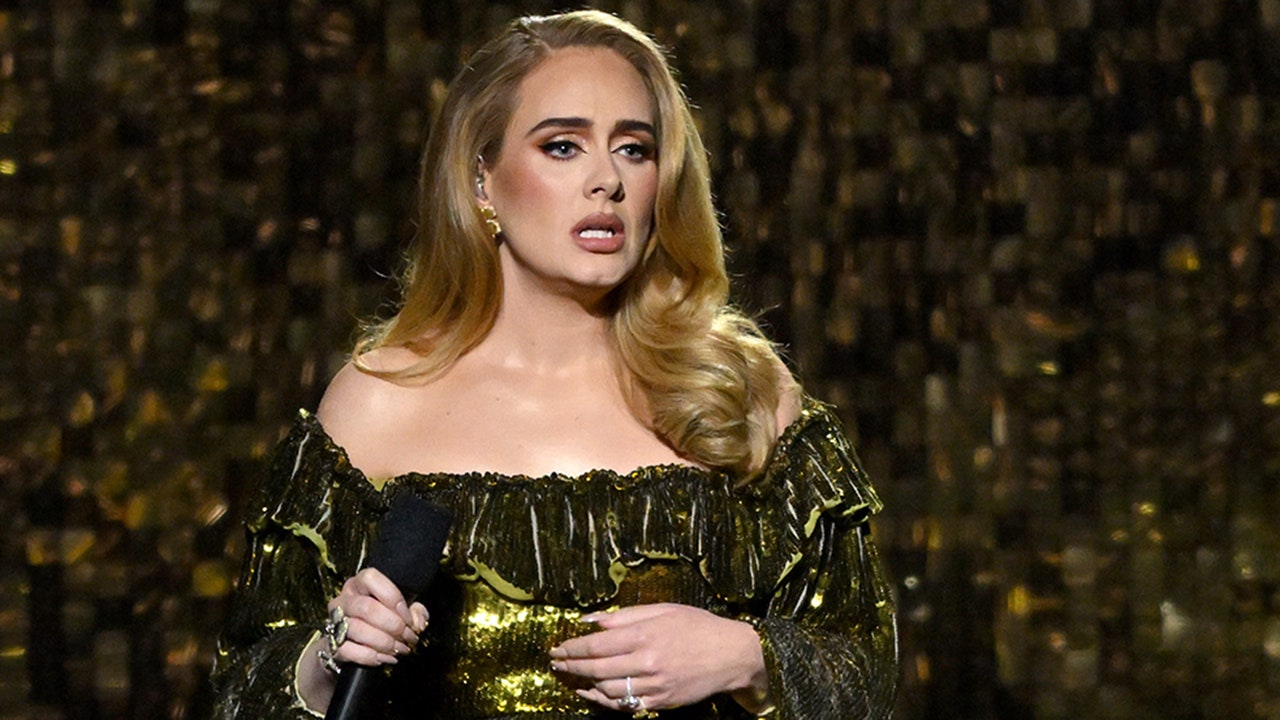 Featured image for Adele's Vegas Show: Fan Defended, Sciatica Attack, and Beyonce Challenge