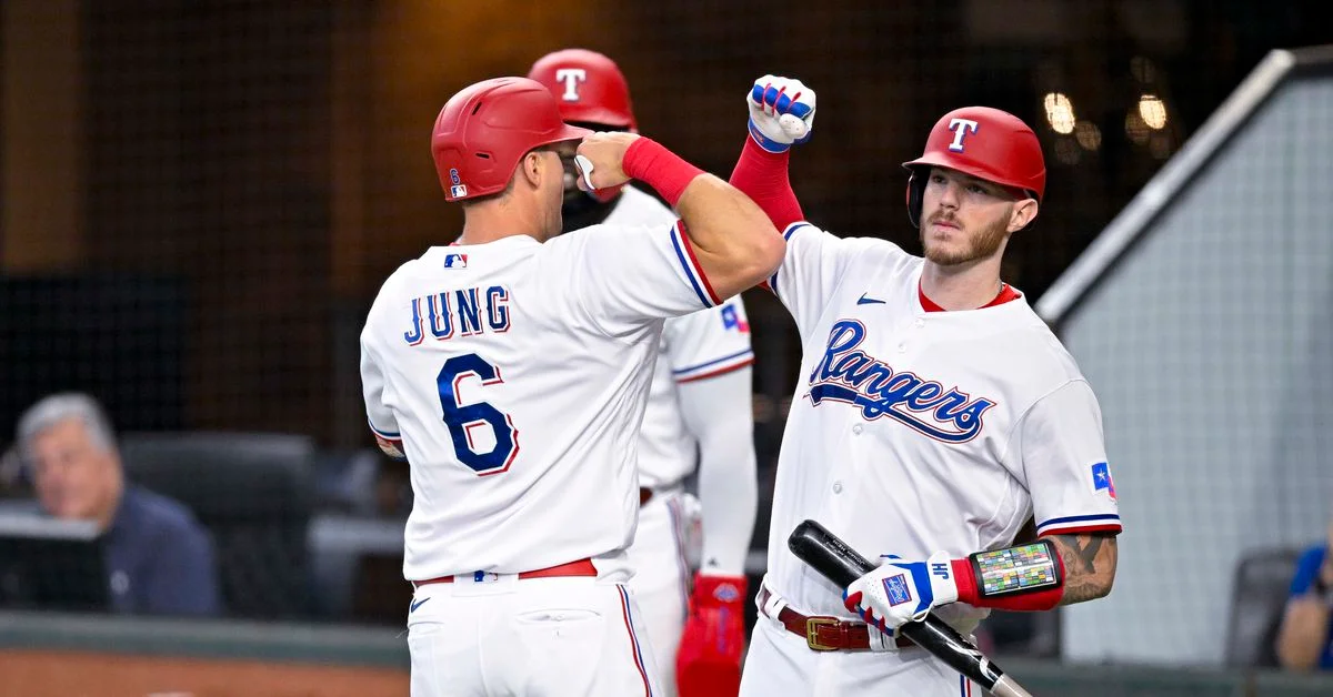 Rangers hit homers to beat Blue Jays in interrupted game.