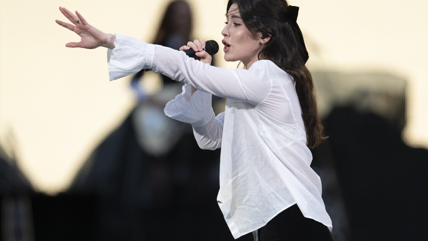 Featured image for "Gracie Abrams: Uniting Strangers Through Music, with Taylor Swift's Praise"