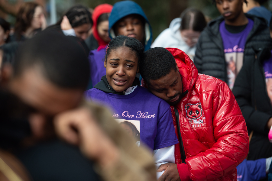 Vancouver community holds emotional vigil for slain mother and daughter.