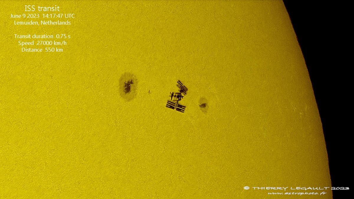 International Space Station Captured Crossing the Sun During Spacewalk in Stunning Footage.