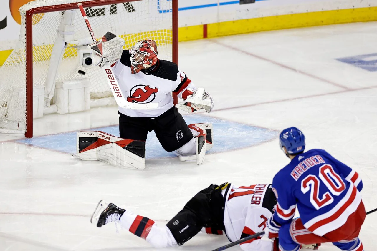 Akira Schmid's Heroic Performance Lifts Devils Over Rangers in Game 3.