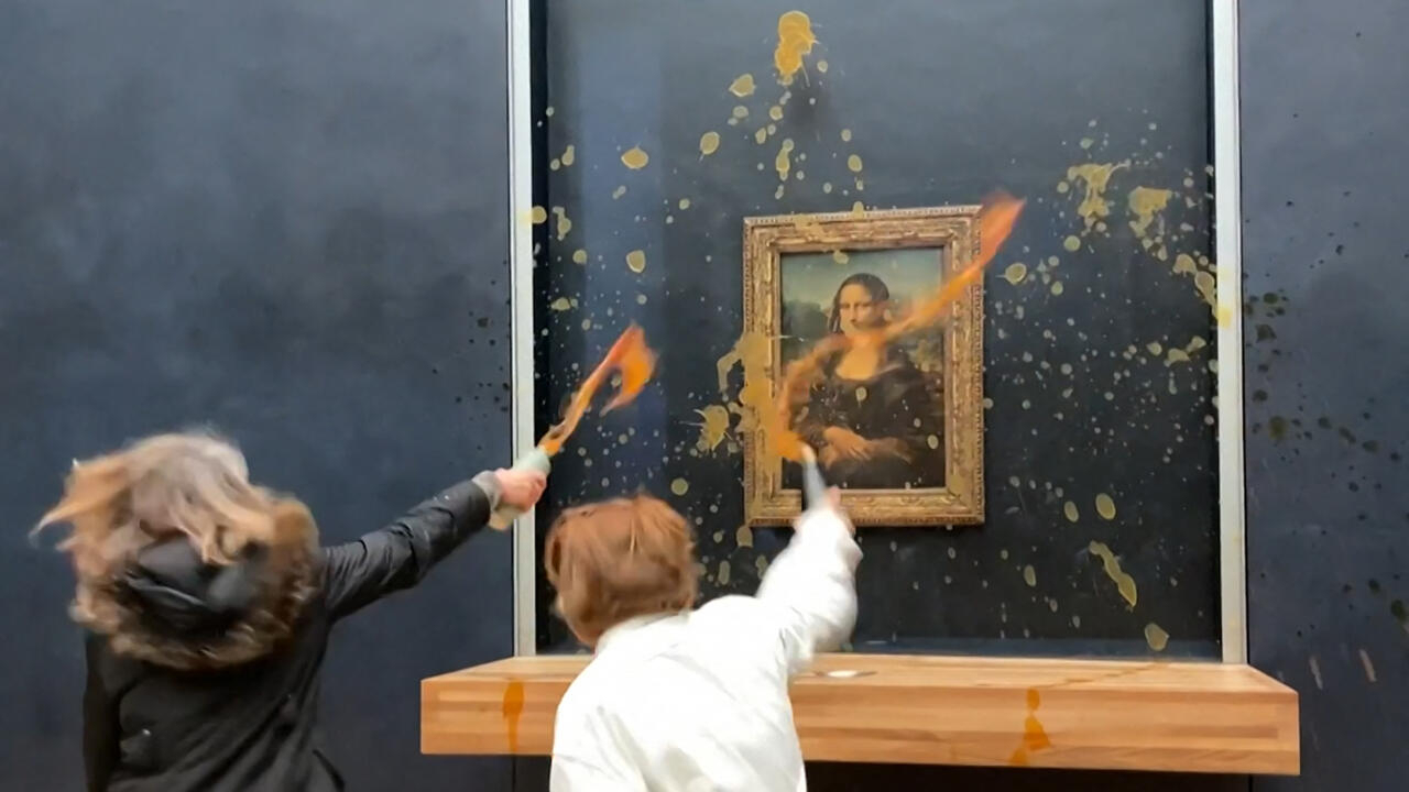 Featured image for Soup-Throwing Climate Activists Target Mona Lisa in Louvre Protest