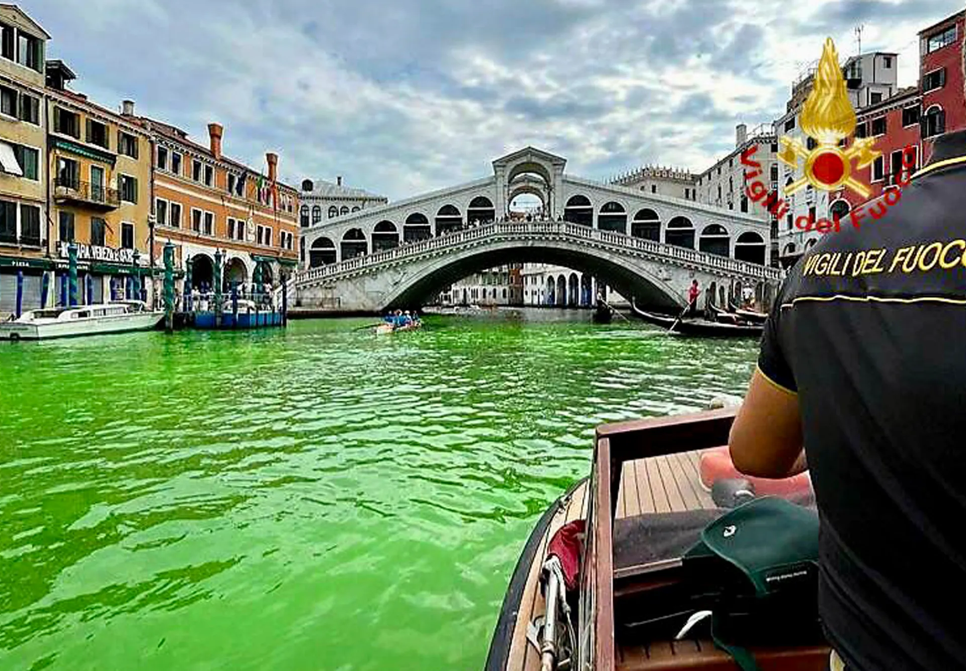 Mystery surrounds green color of Venice canal water.