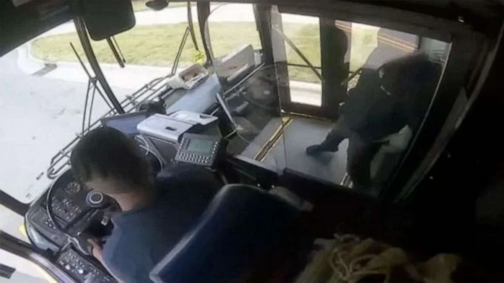 Bus driver and passenger engage in dramatic shootout.