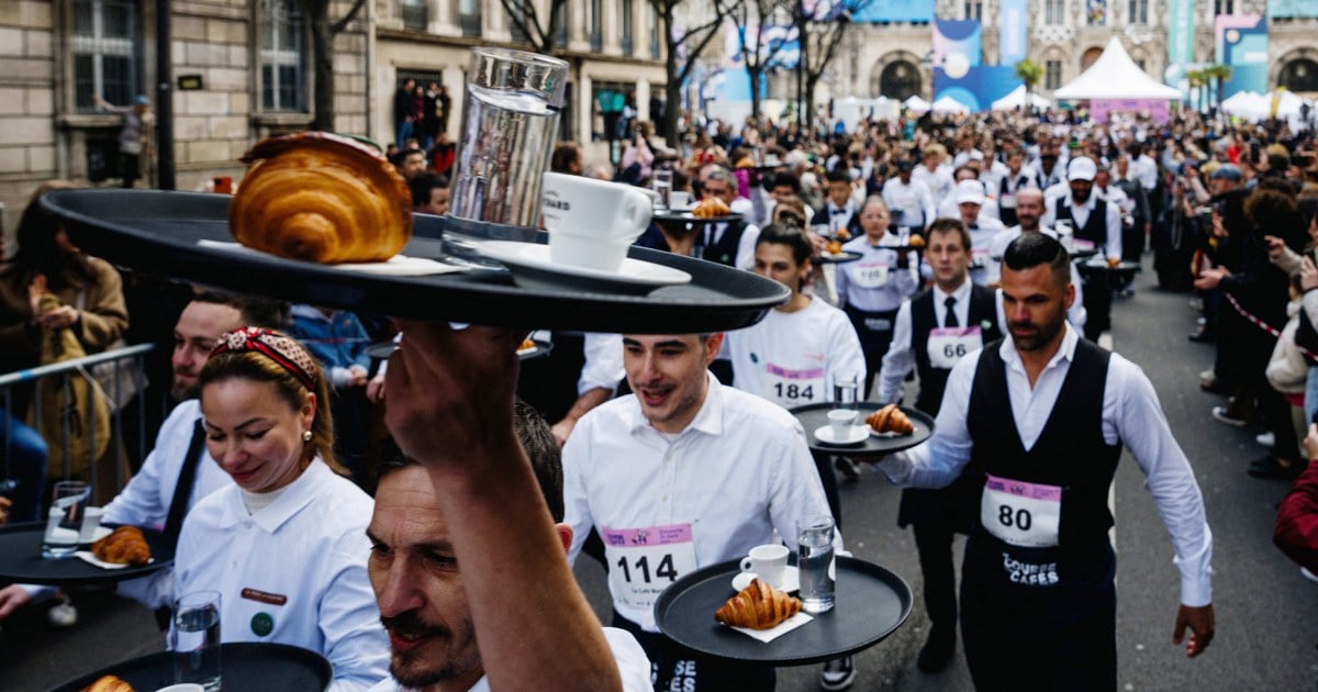 Featured image for "Parisian Waiters Revive Storied Course des Cafés Ahead of Olympics"