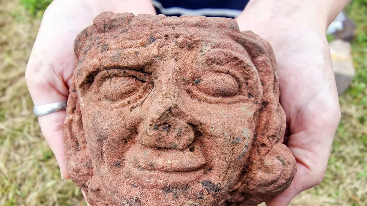 Featured image for Archaeologists Discover Smiling Ancient Face Beneath Farm