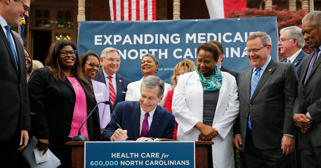 North Carolina Governor Signs Medicaid Expansion Bill into Law Despite Republican Opposition.