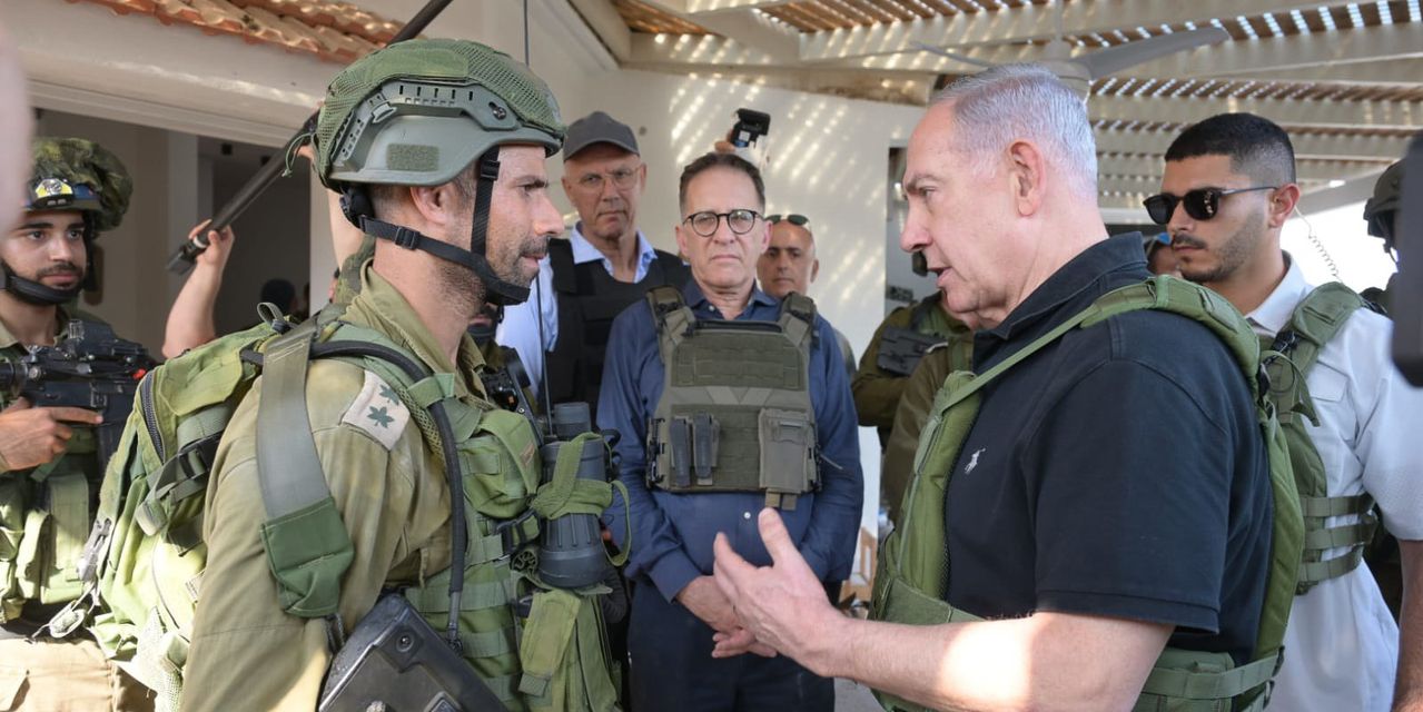 "Netanyahu's Visit to Massacre Sites Signals Impending Invasion as Iran Threatens Intervention"