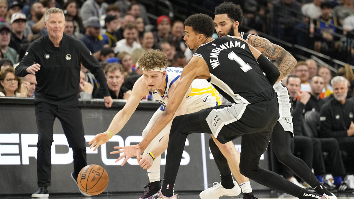 "Warriors' Pivotal Team Effort Secures Win Against Spurs"