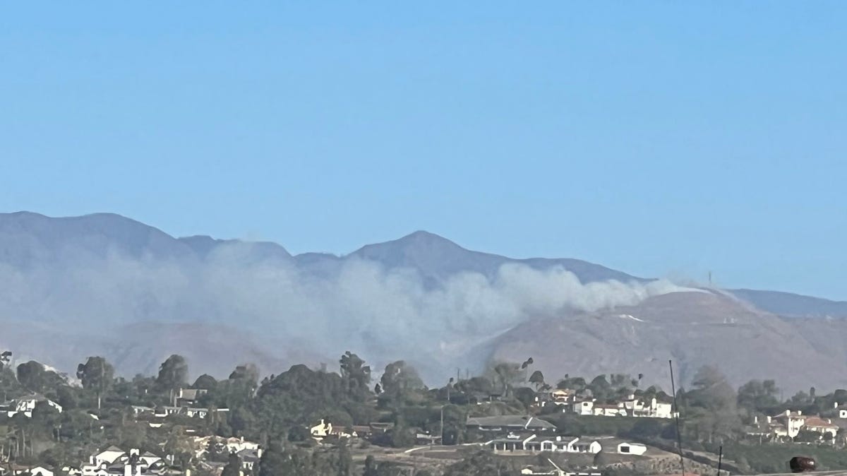 "Somis Brush Fire: Evacuations and Containment Efforts Amidst Santa Ana Winds"