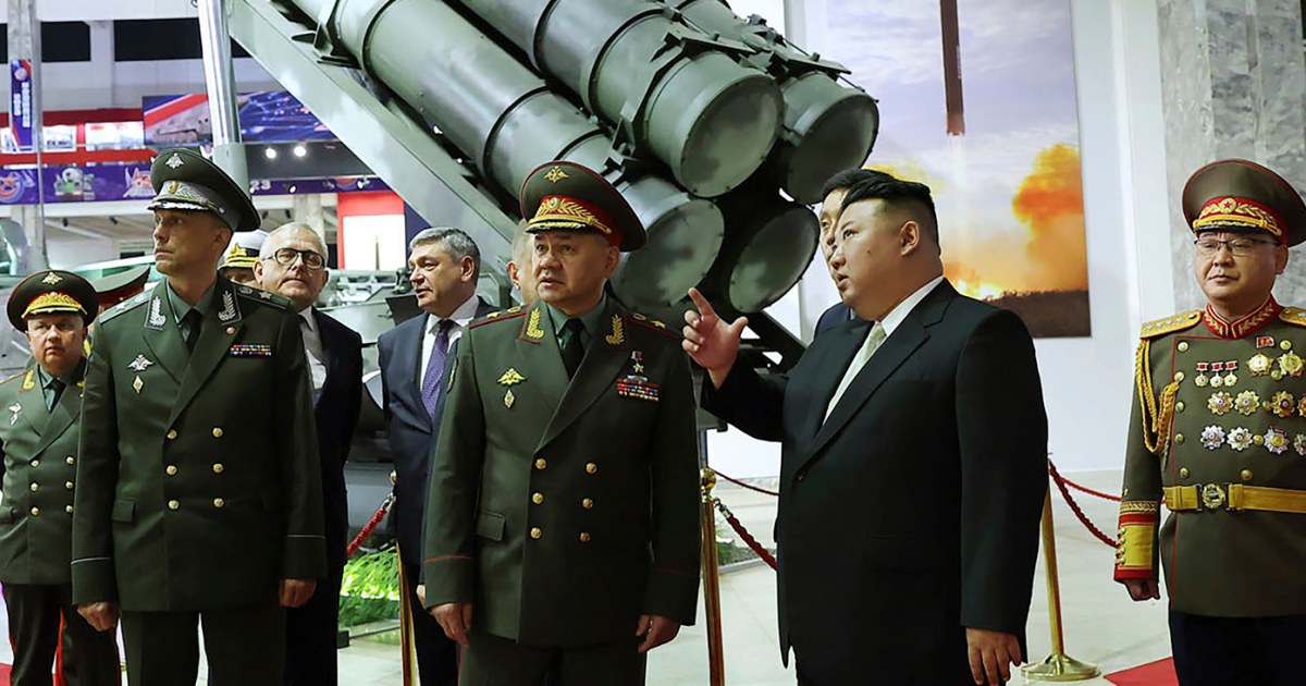 "Kim Jong Un's Provocative Display: Banned Missiles Revealed to Russian Minister"