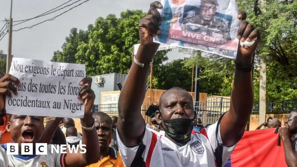 Niger Coup Leader's Warning Sparks Concerns over Military Intervention and Aid Suspension