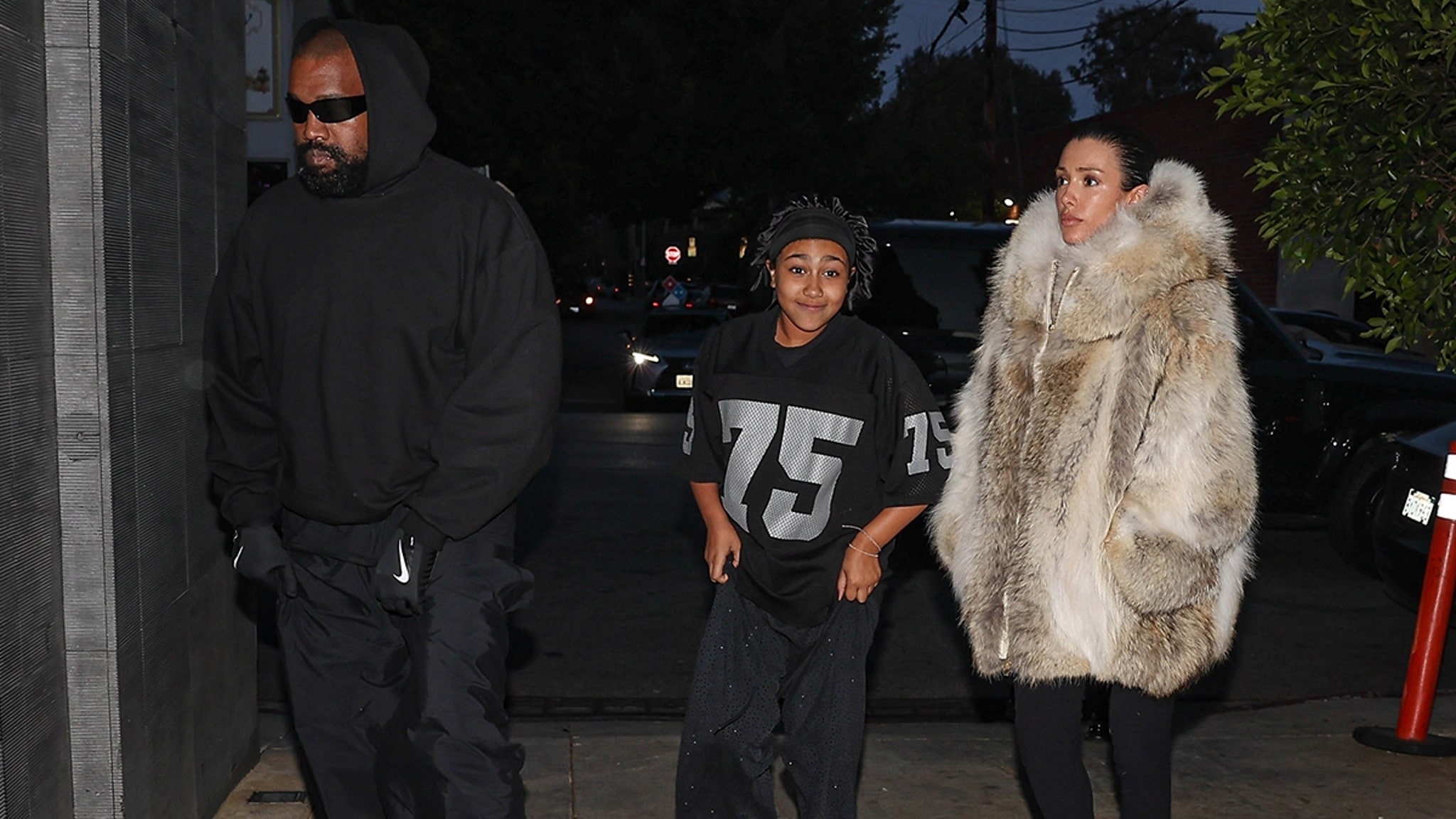 Featured image for "Bianca Censori's Fur-Clad Outings with Kanye and North West"