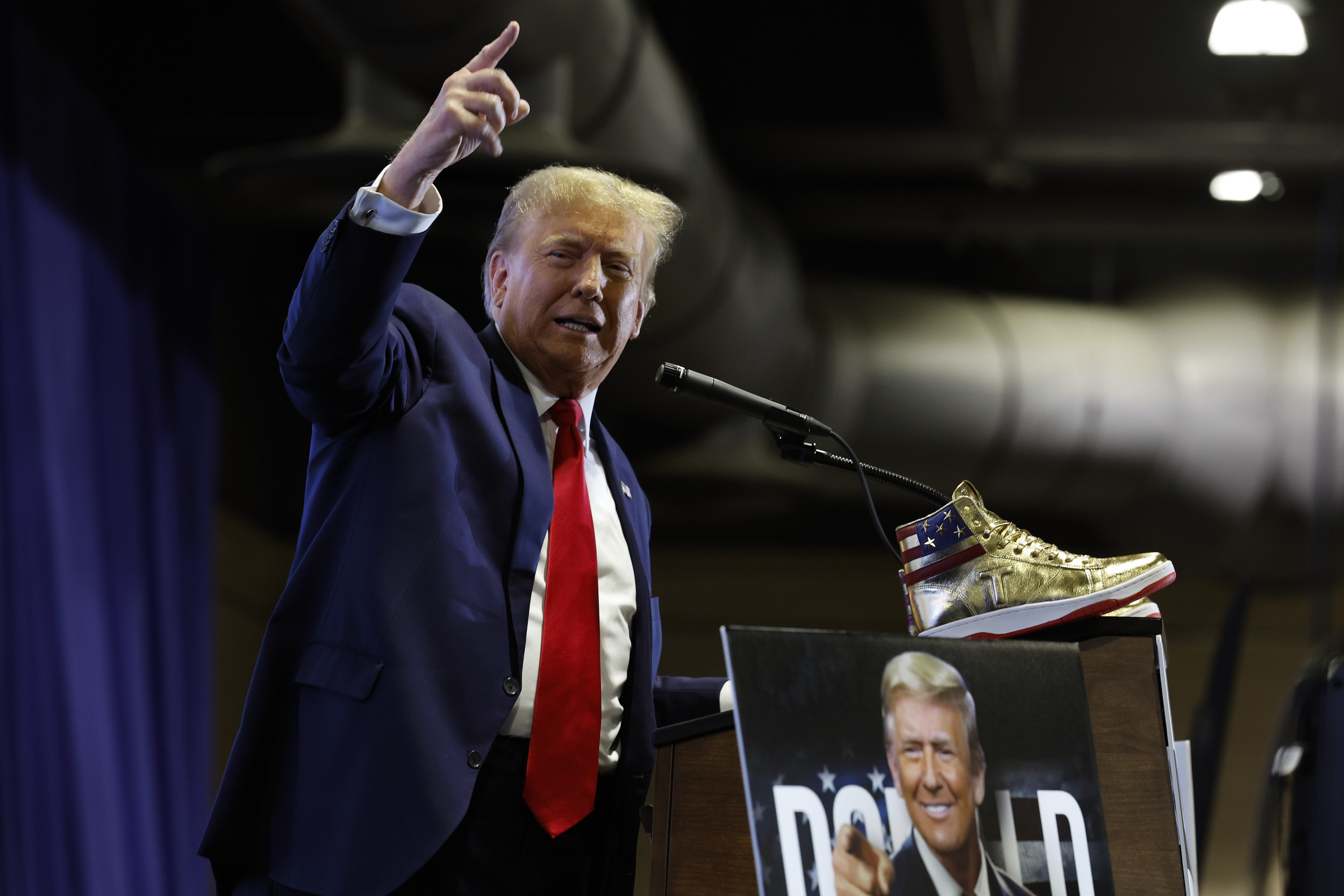 Featured image for "Trump's Sneaker Launch Met with Boos Amid Legal Battles"