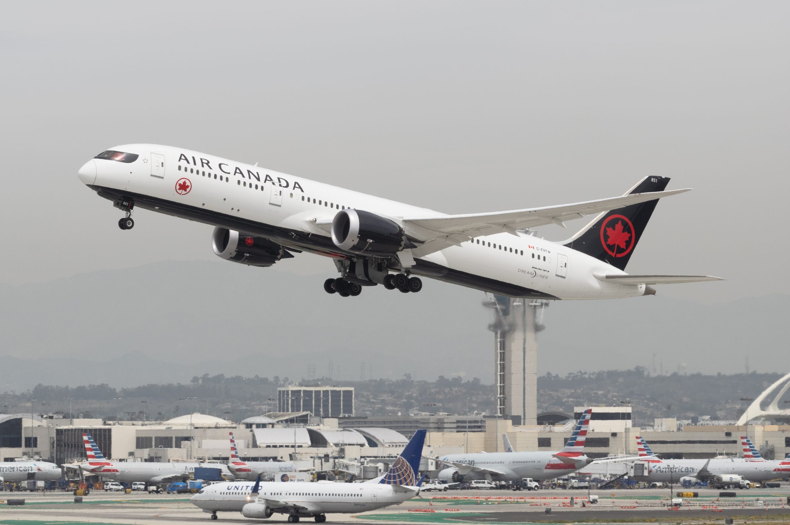 Off-Duty Pilot Saves Air Canada Plane After First Officer Falls Ill.