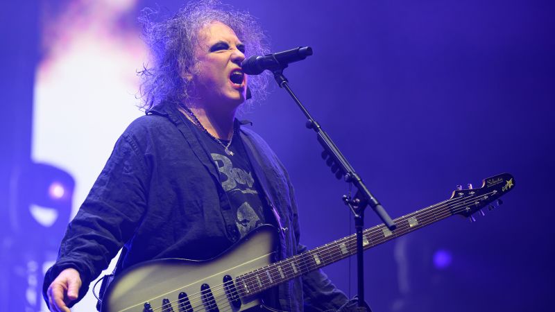 The Cure's Robert Smith disgusted by Ticketmaster fees for US tour.