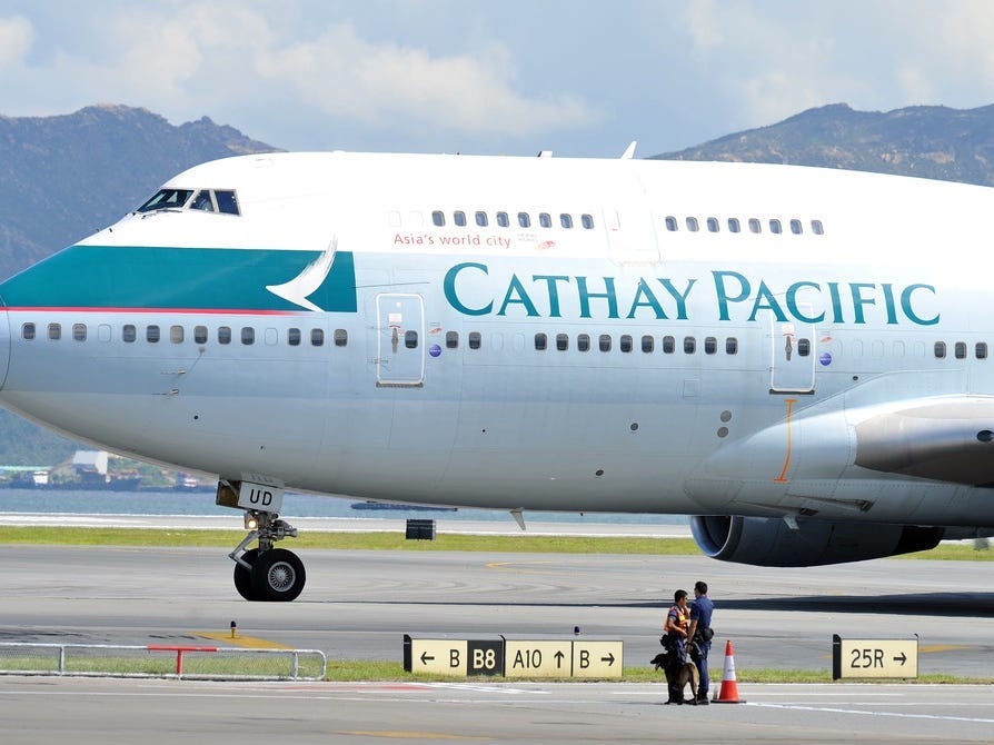 Featured image for Cathay Pacific Fires Flight Attendants for Discrimination and Mocking Passengers' English