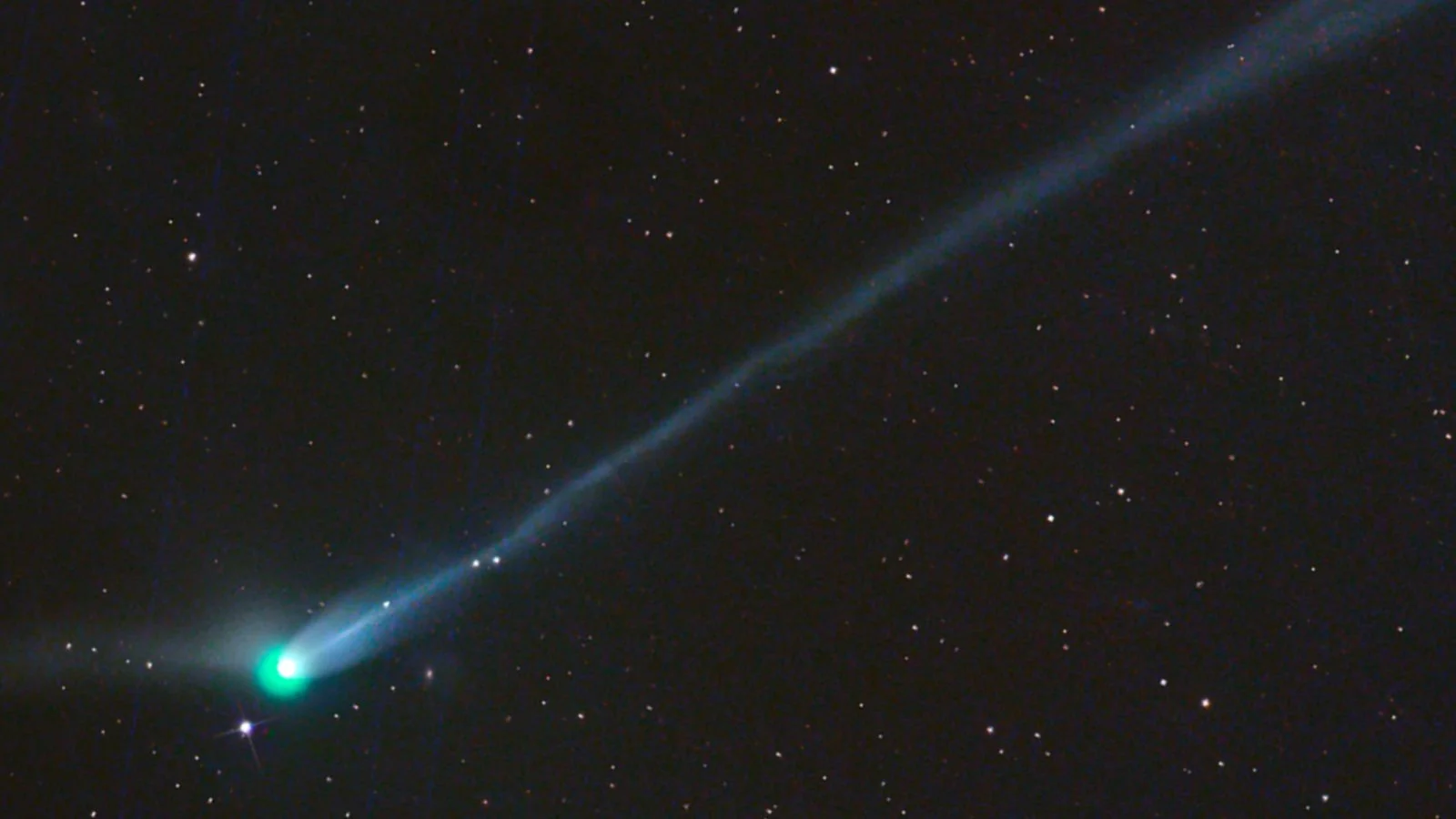 City-Sized Green Comet Eyes Interstellar Exit