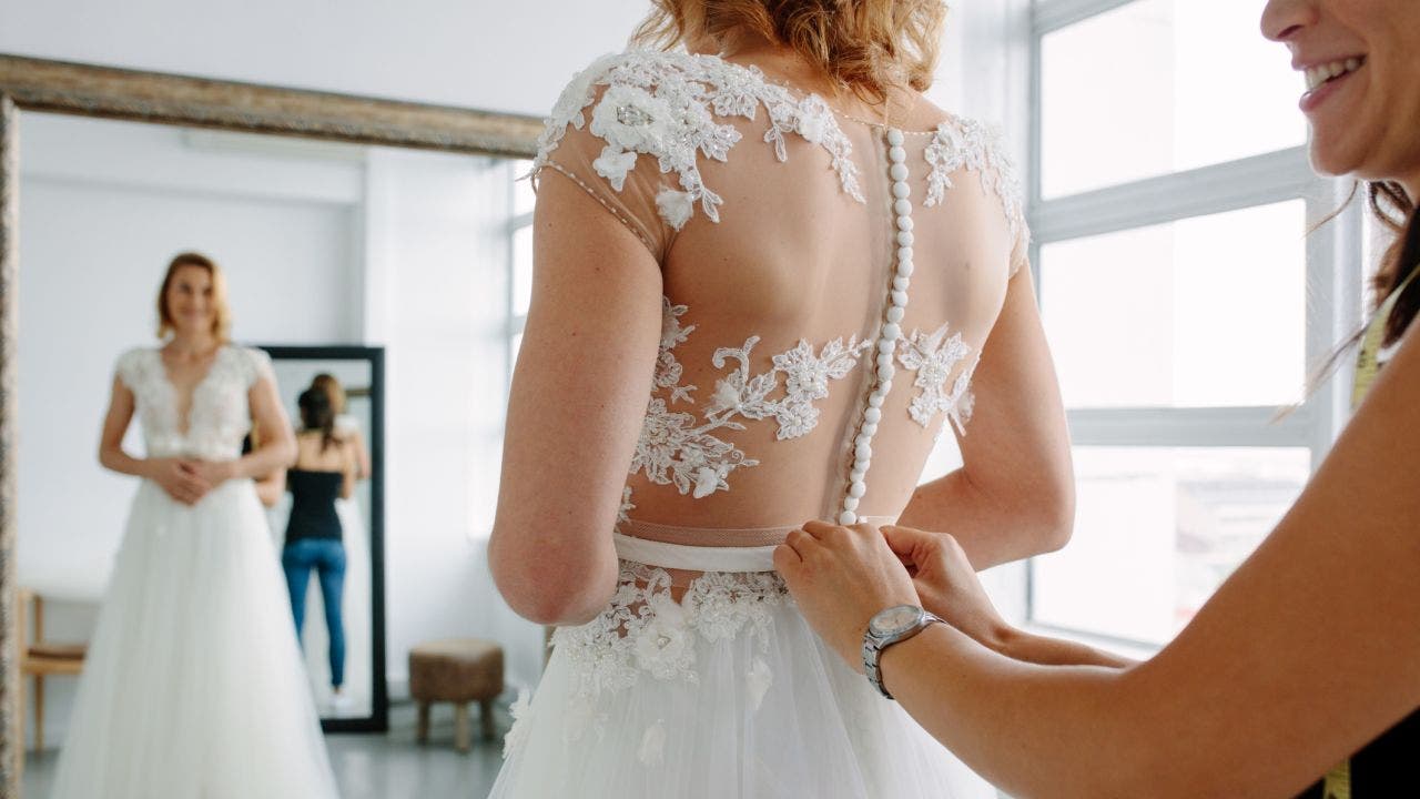 Featured image for "Georgia business owner rescues abandoned wedding dresses, reunites brides"