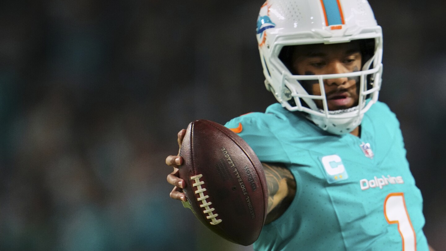 "Dolphins' Playoff Hopes Hang in the Balance as Bills-Dolphins Clash for AFC East Crown"