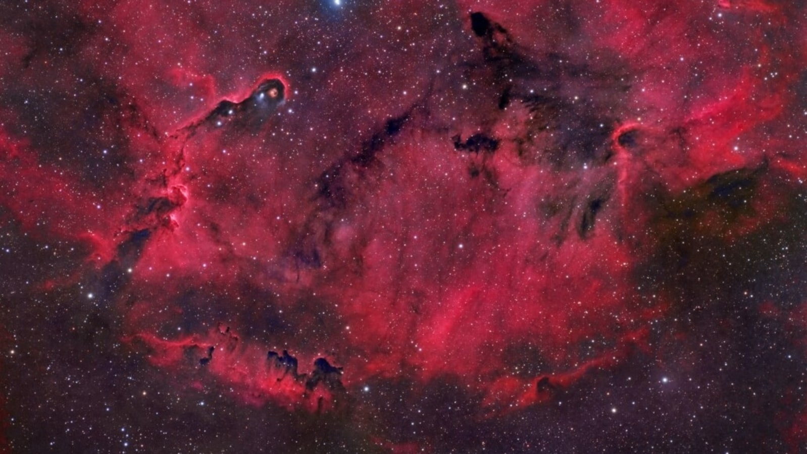 "NASA's Stunning Daily Astronomy Pictures: Elephant's Trunk Nebula and Double Ring Galaxy"