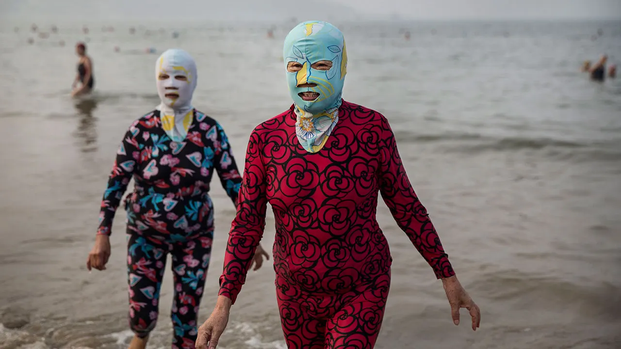 China's Scorching Summer Sees Rise in Bizarre 'Facekini' Fashion Trend