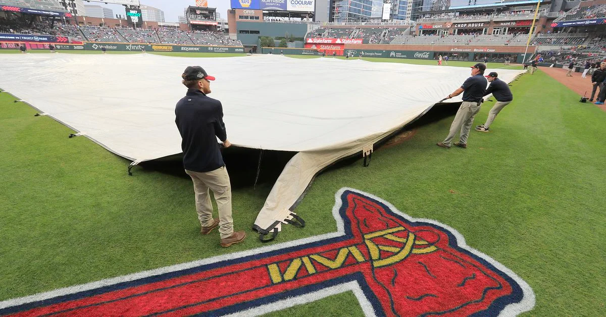 Rain delay doesn't stop Braves from beating Mets 6-4.