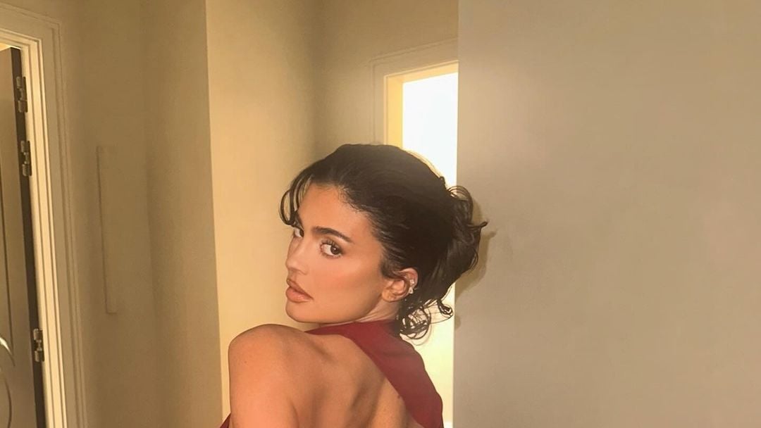 Featured image for "Kylie Jenner Stuns in Red Dress and Launches Cosmic Perfume"