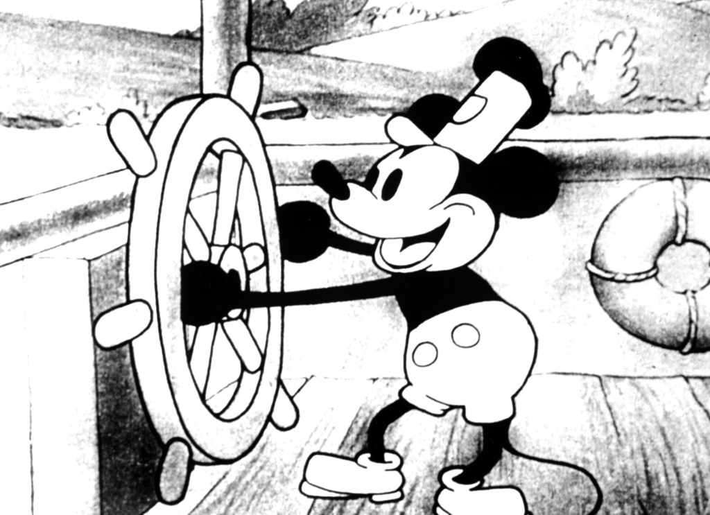 Featured image for "Mickey Mouse Turns Slasher as 'Steamboat Willie' Enters Public Domain with New Horror Film"