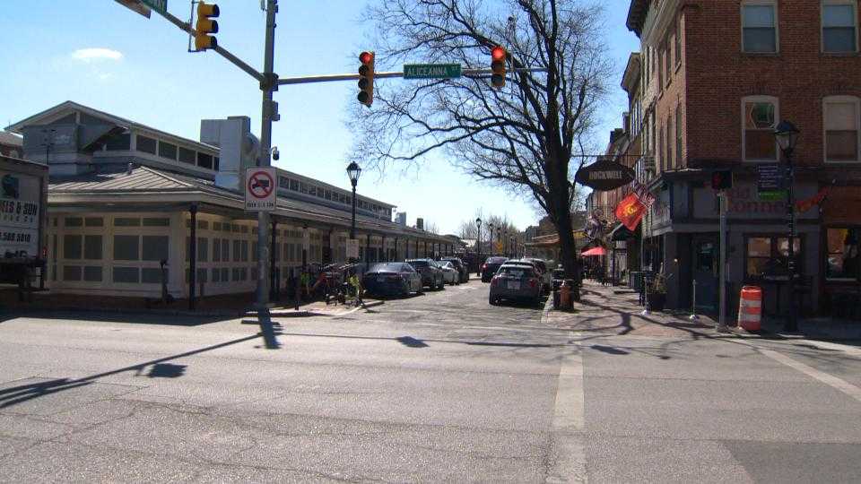 Police investigate shooting at Fells Point pizza shop involving security guard.