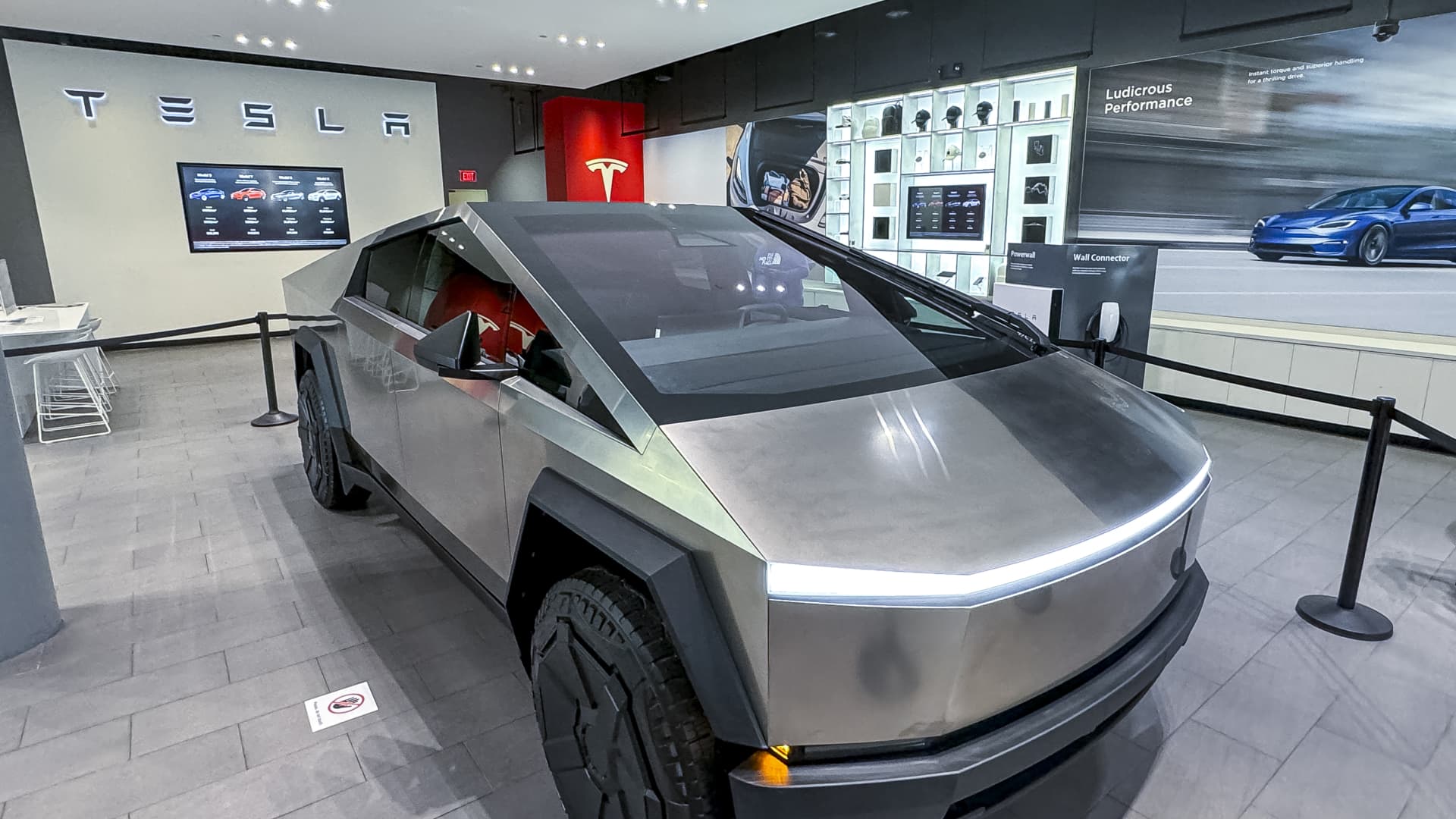 "Tesla Surpasses Annual Goals with Record 1.8M Deliveries in 2023, Despite Losing EV Sales Crown"