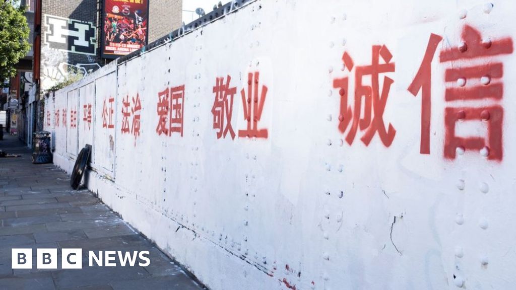 "London's Brick Lane Transformed by Chinese Political Slogans in Street Art"