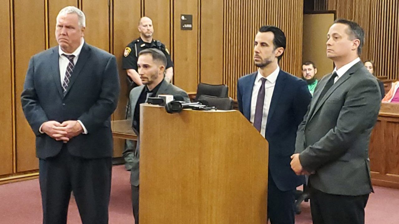 Pair plead guilty in Cleveland fishing scandal.