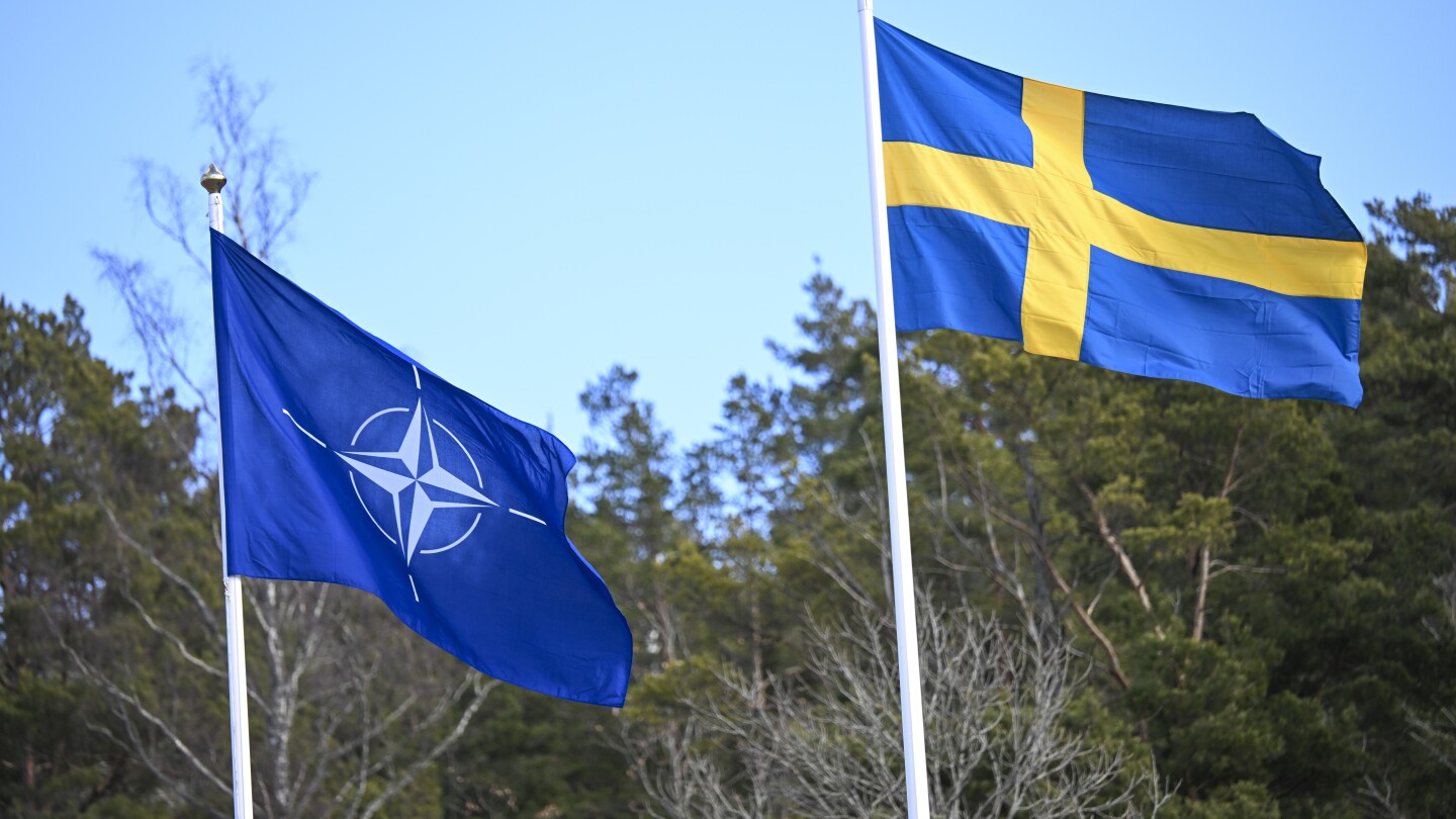 "Sweden Joins NATO and Raises Flag at Headquarters"
