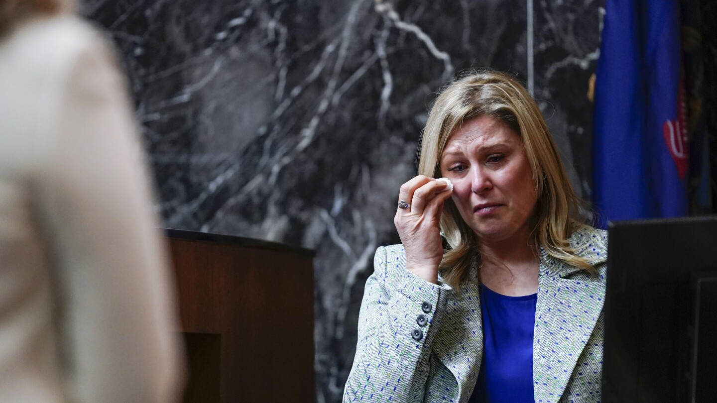 "Michigan School Shooting Trial: Father's Role in Preventing Tragedy Under Scrutiny"