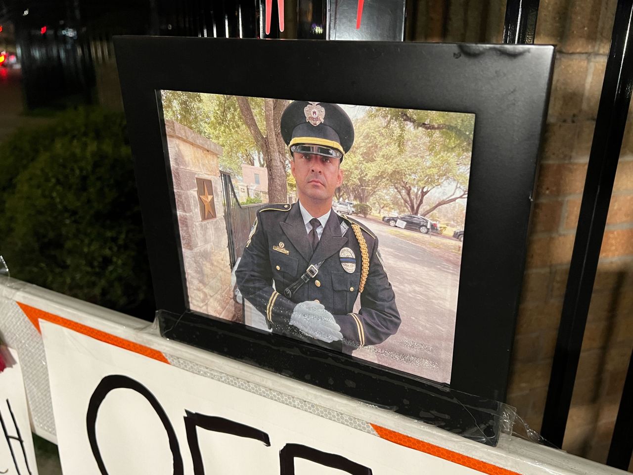 "Revealing Insights: Search Warrant Uncovers Suspect's Involvement in APD Officer's Death"