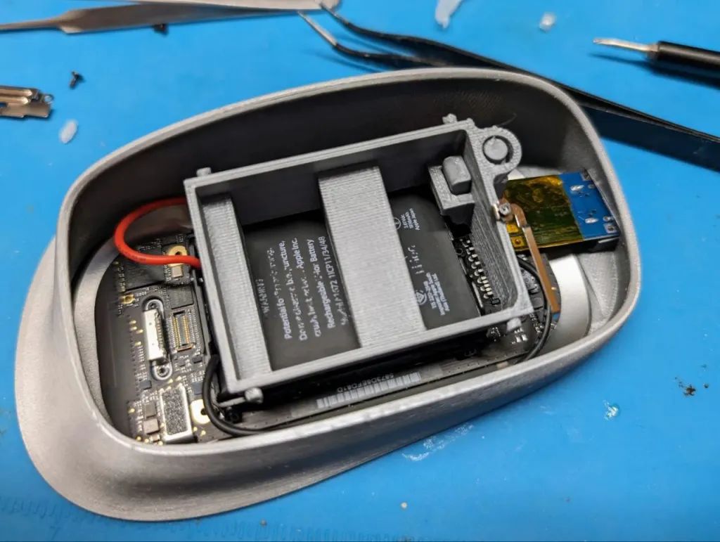 Featured image for "Revolutionizing Apple's Magic Mouse: Hacking to Eliminate Flaws"